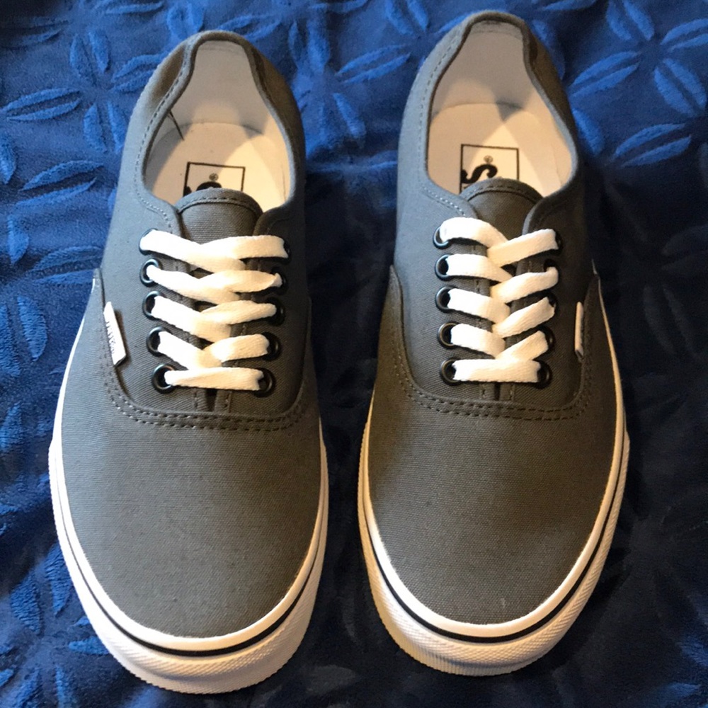 Gray Vans size 6.5 men, size 8.0 women.